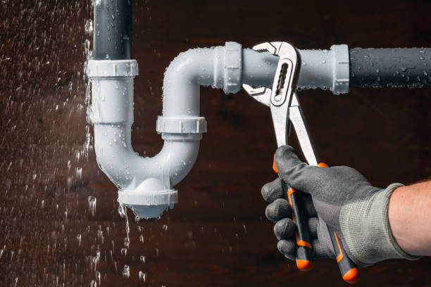 Professional Plumbing technician working in Roland, OK